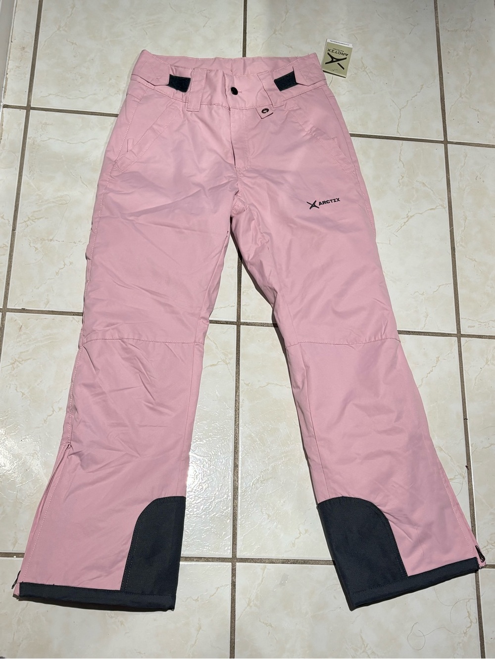 Arctix Pink woman’s Insulated Snow Pants with Black Reinforced Hems